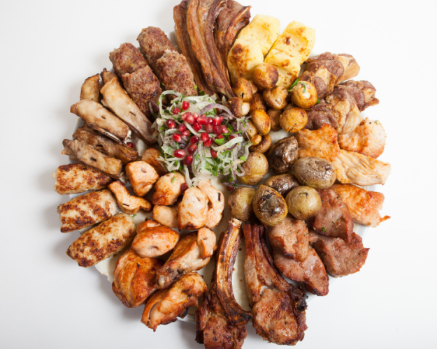 GrilledMeatAndGrilledSausagesInFocus GrilledMeatAndGrilledSausagesInFocus